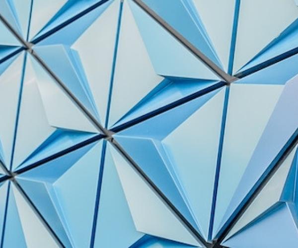 a blue building with geometric shapes