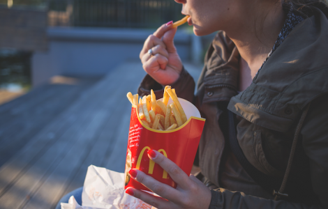 someone eating mcdonald's fries