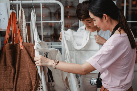Two women shopping at a small business