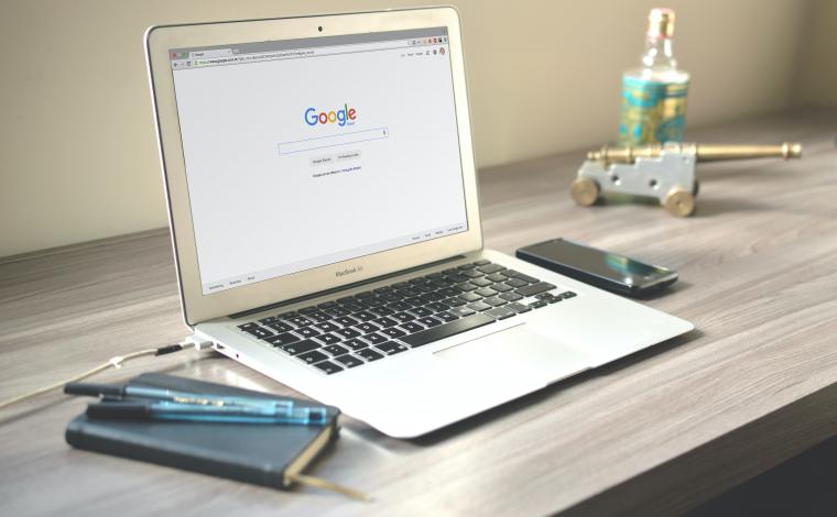 a laptop with google open on the screen