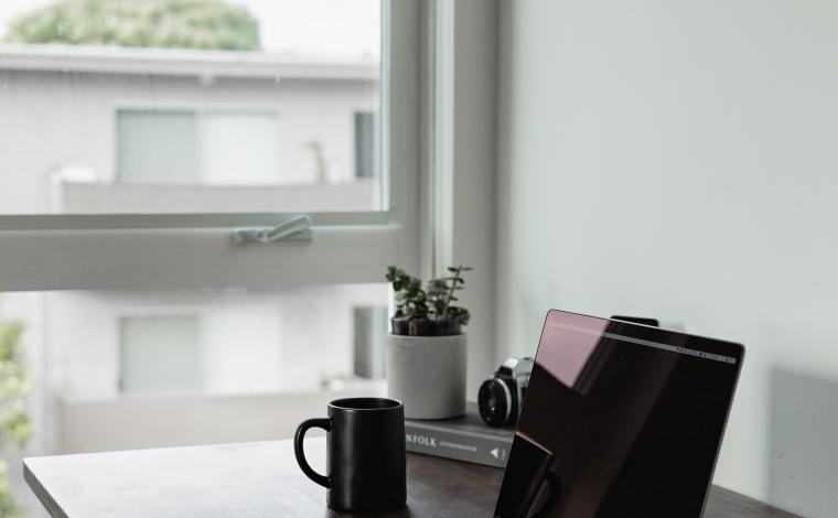 home office desk with laptop