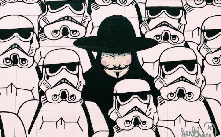 an art piece of the main character from v for vendetta in the middle of a fleet of storm troopers from star wars